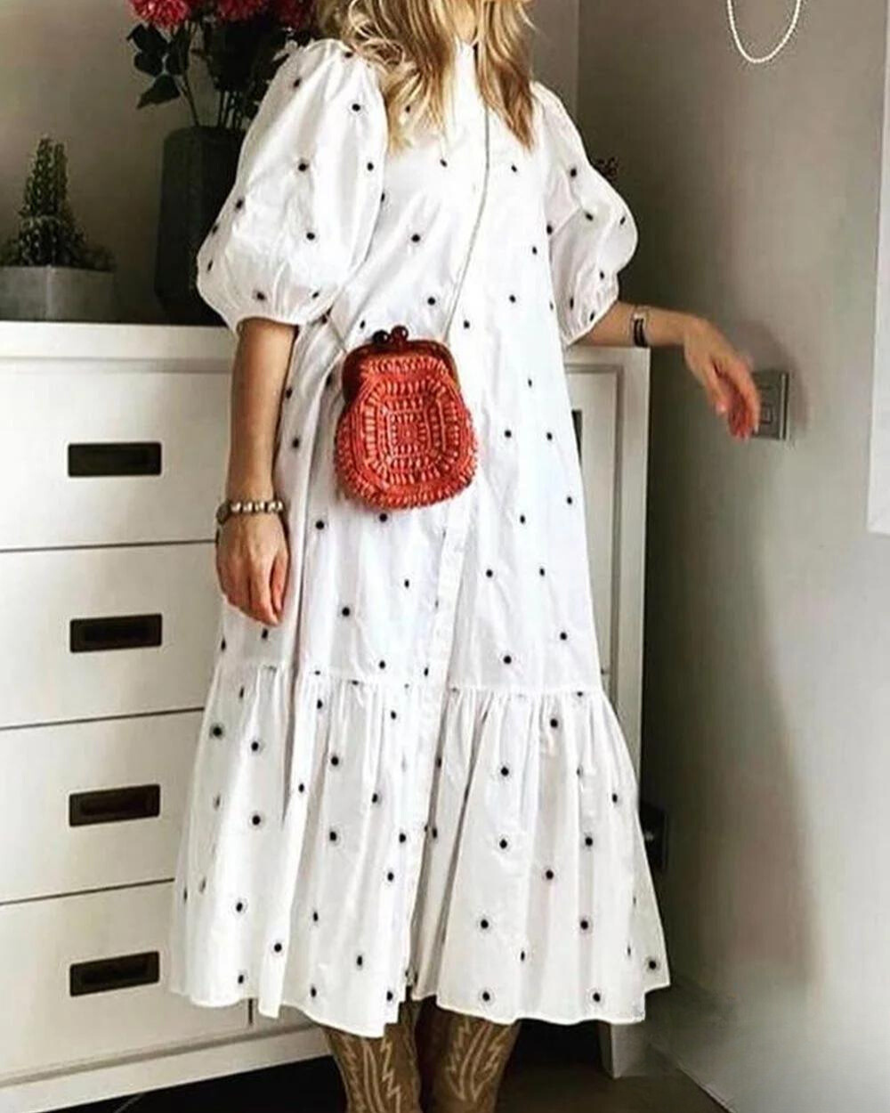 Lange jurk met korte pofmouwtjes