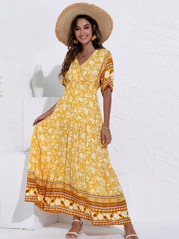 Modieuze swingjurk met hoge taille en V-hals