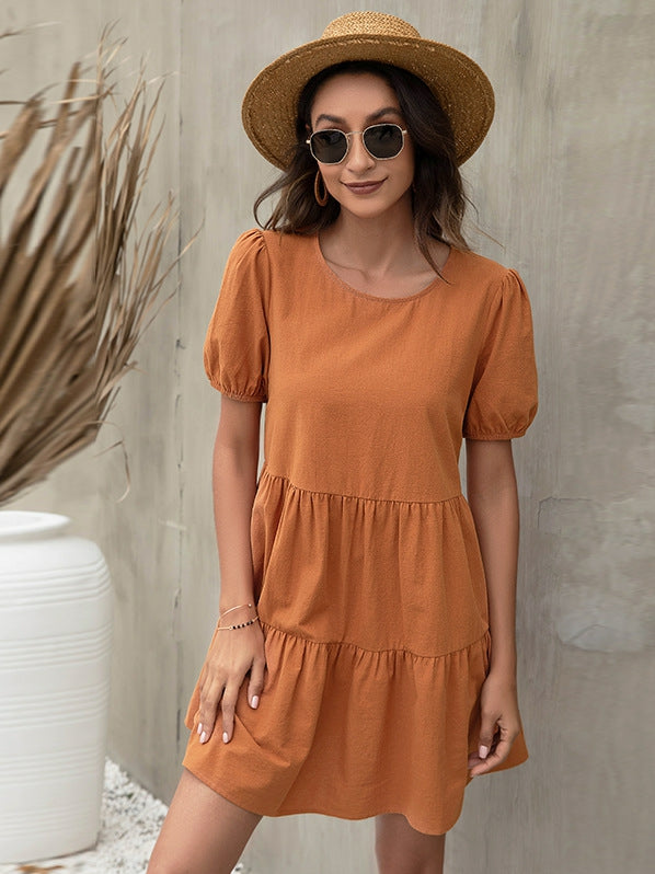 Europese jurk met A-lijn rok en pofmouwtjes