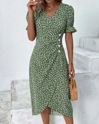 Florale midi-jurk met overslag en volantmouwen