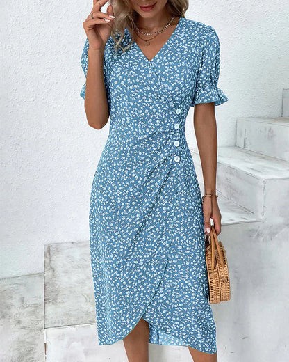 Florale midi-jurk met overslag en volantmouwen