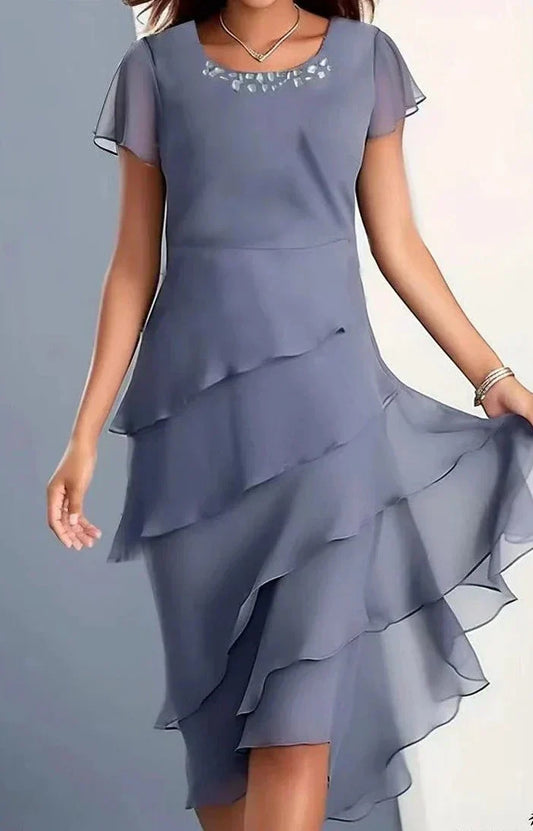 Elegante jurk met plooien en luchtigheid