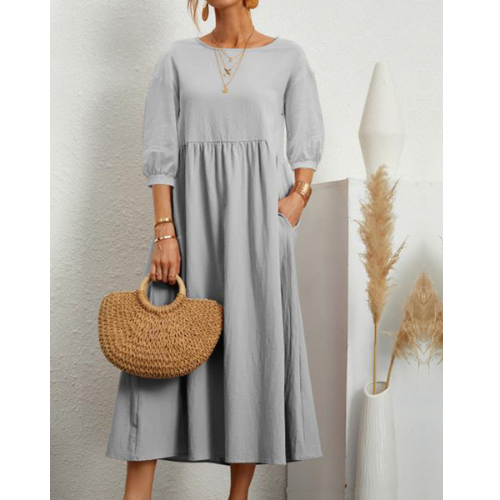 Elegante zomerjurk met avondjasje en romantische details
