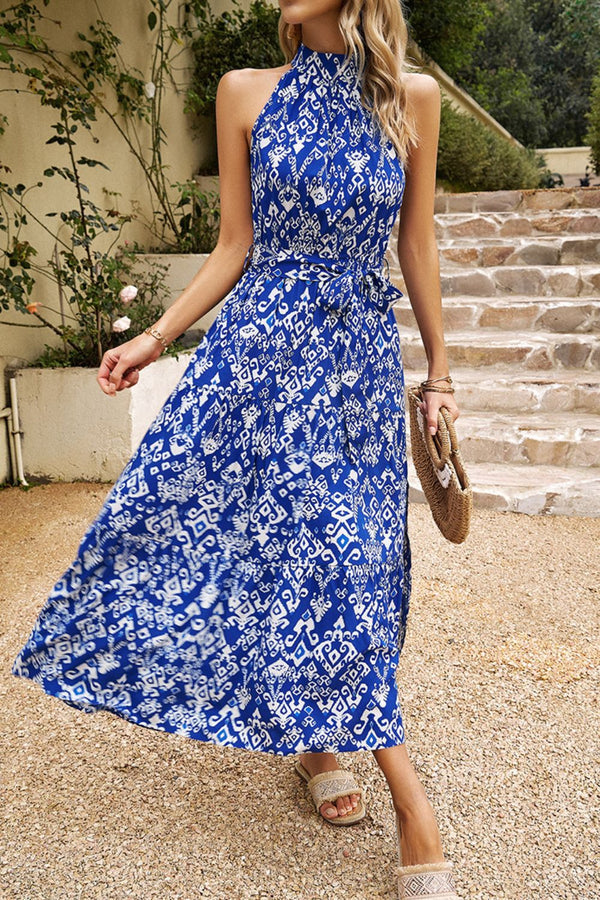 Gesplitste mouwloze jurk met print en mock-neck