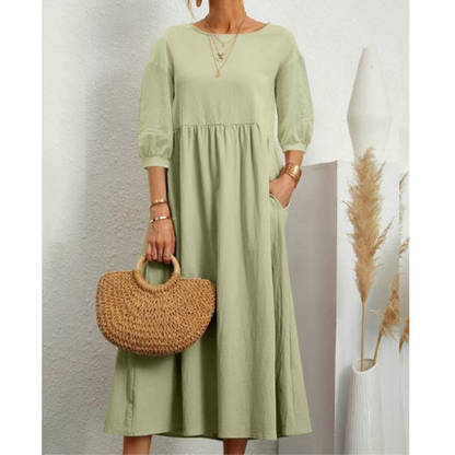 Elegante zomerjurk met avondjasje en romantische details