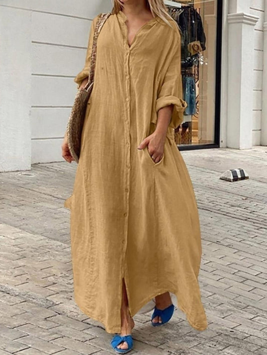 Losse, casual, effen pocketjurk met een rij knopen en lange mouwen