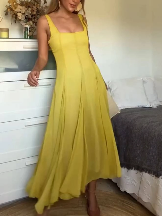 Elegante lange jurk met vierkante halslijn en spaghettibandjes, ideaal voor alledaagse dagen