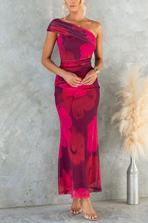 Asymmetrische lange jurk met elegante bloemenprint