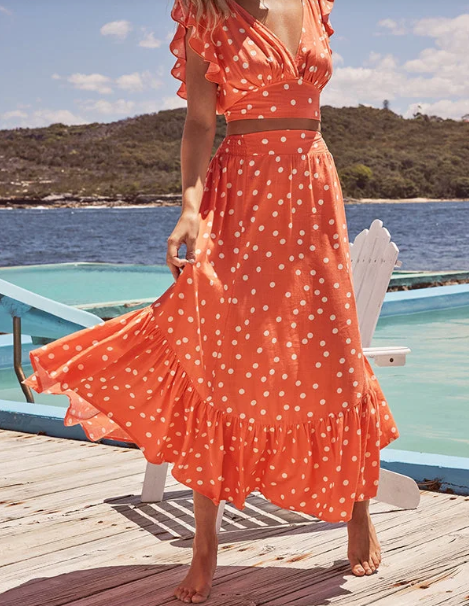 Poka jurk met stippenprint uit de collectie "Day on The Beach".