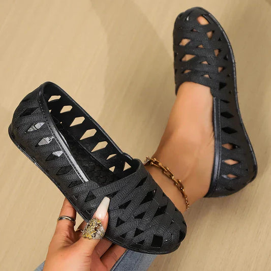 Modieuze zwarte plastic platte schoenen