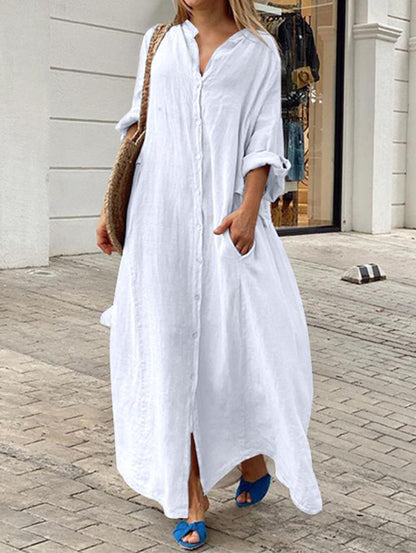 Losse, casual, effen pocketjurk met een rij knopen en lange mouwen