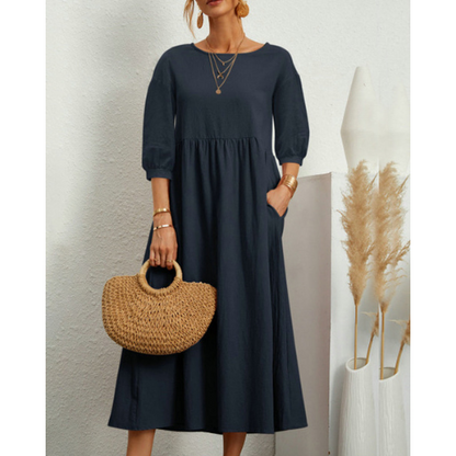 Elegante zomerjurk met avondjasje en romantische details