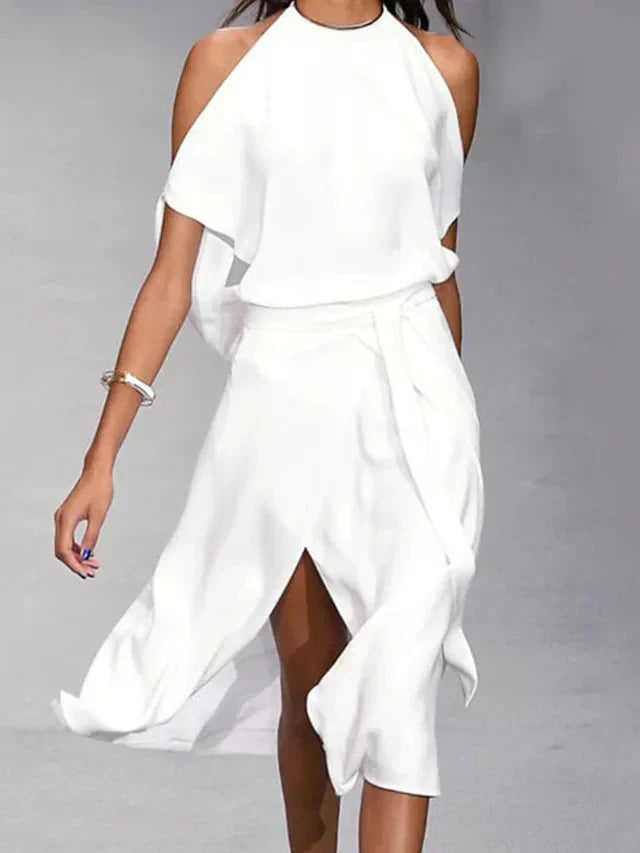 Asymmetrische midi-jurk met blote schouders en elegante beweging