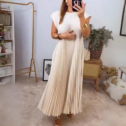 Lichte en elegante geplooide jurk