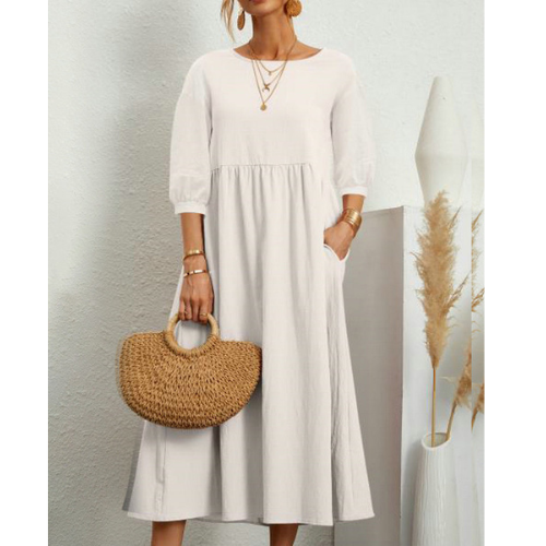 Elegante zomerjurk met avondjasje en romantische details