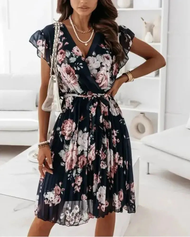 Geplooide jurk met bloemenprint en riem