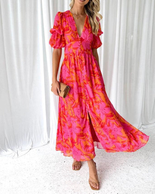 Lange jurk in vintage stijl met knopen en korte pofmouwtjes