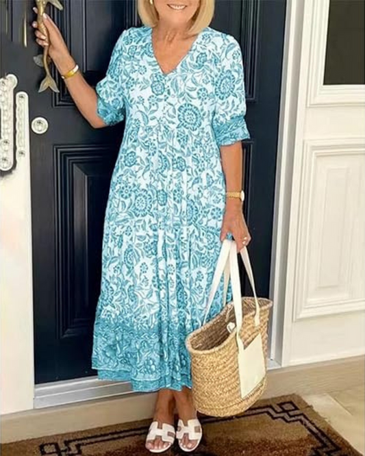 Lange zomerjurk met print en korte mouwen voor een elegante look