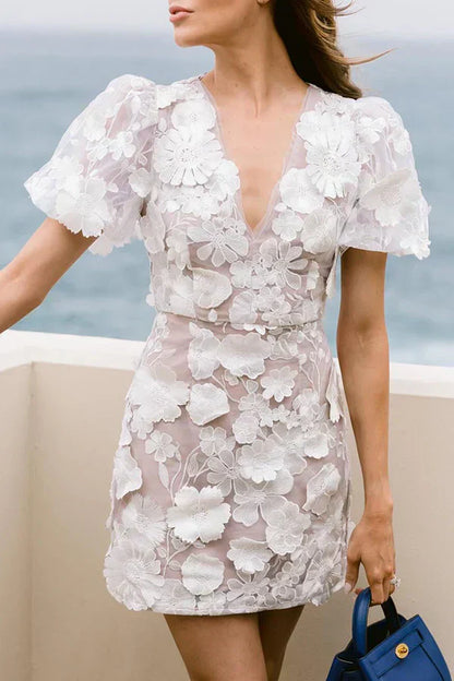 Lina - Korte jurk met bloemenprint en pofmouwen