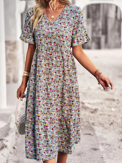 Elegante jurk met korte mouwen en V-hals