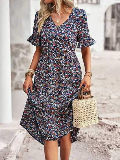 Elegante jurk met korte mouwen en V-hals