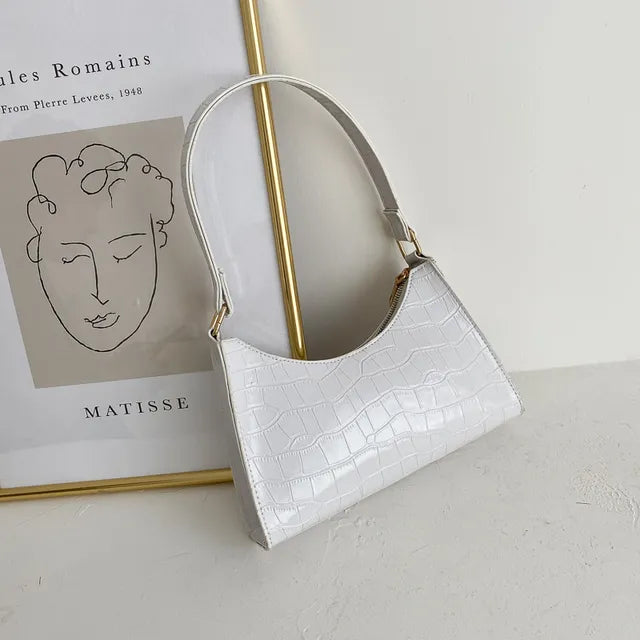 Mallie - Dames schoudertas in retro leer