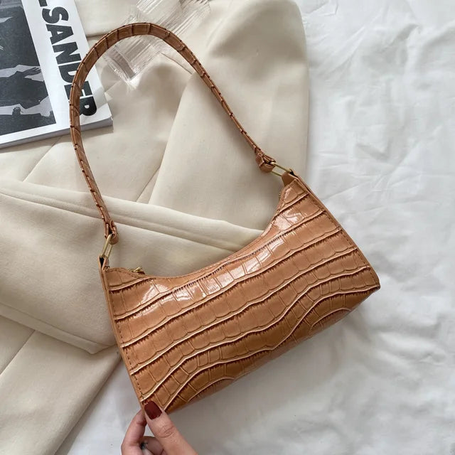 Mallie - Dames schoudertas in retro leer