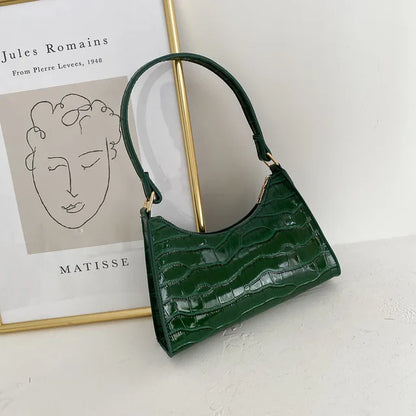 Mallie - Dames schoudertas in retro leer