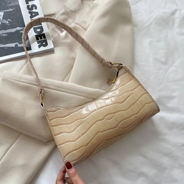 Mallie - Dames schoudertas in retro leer