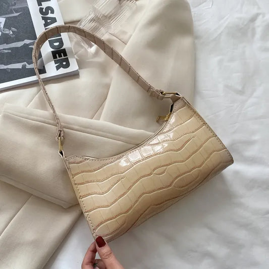 Mallie - Dames schoudertas in retro leer