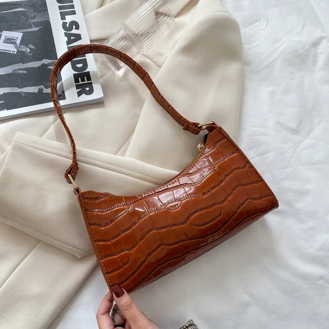 Mallie - Dames schoudertas in retro leer