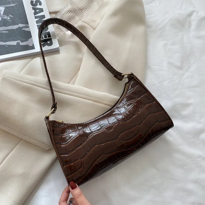 Mallie - Dames schoudertas in retro leer