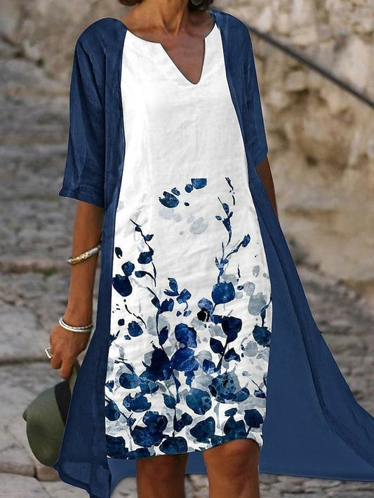 Nollie - Tweedelige midi-jurk met blauwe bloemenprint en elegante halve mouwen