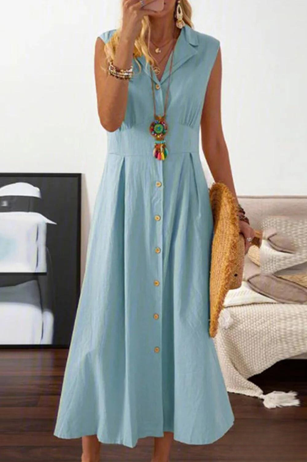 Peggy - Mouwloze midi-jurk met overslagknopen