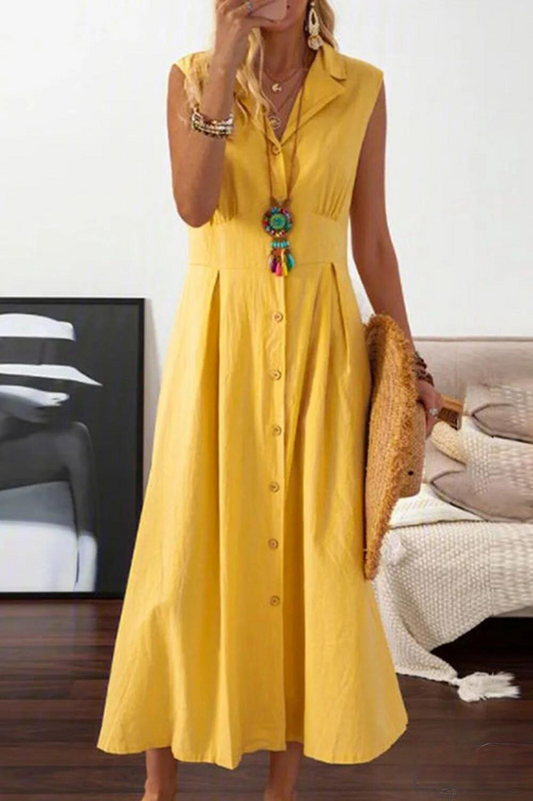 Peggy - Mouwloze midi-jurk met overslagknopen