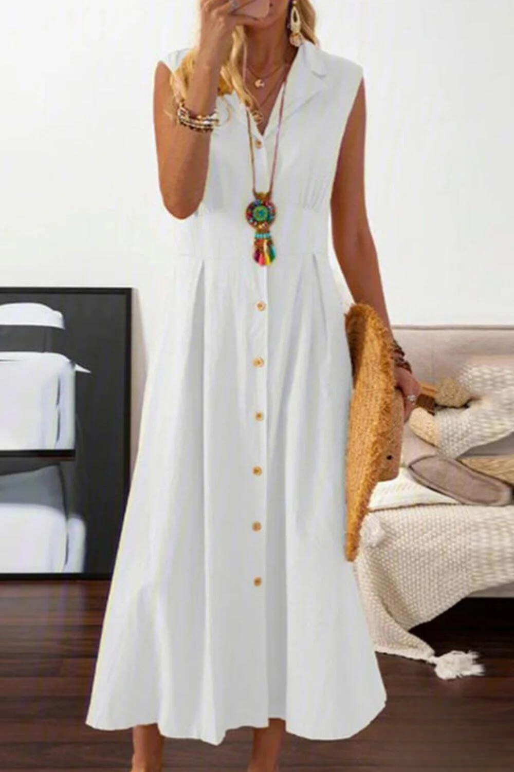 Peggy - Mouwloze midi-jurk met overslagknopen