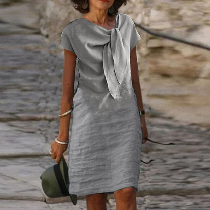 Elegante, getailleerde mini-jurk met korte mouwen voor dames
