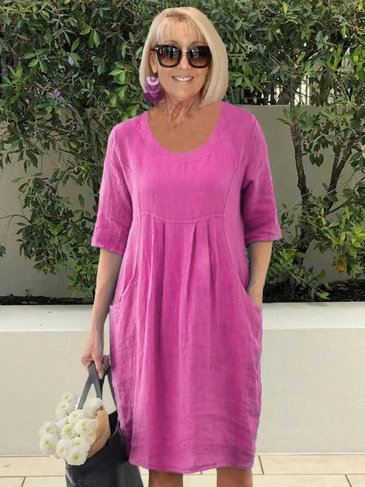 Casual zomer midi-jurk met korte mouwen en functionele zakken