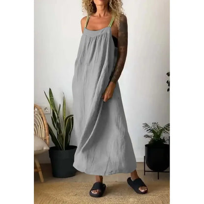 Lange chambray jurk met zakken en contrasterende schouderbandjes in de kleur beau blue