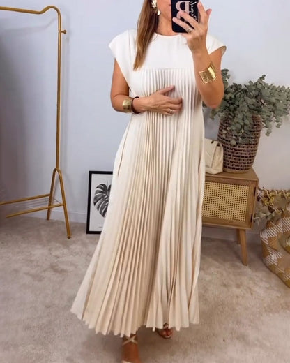 Casual midi-jurk met geplooid patroon, ideaal voor een moderne en ontspannen look.
