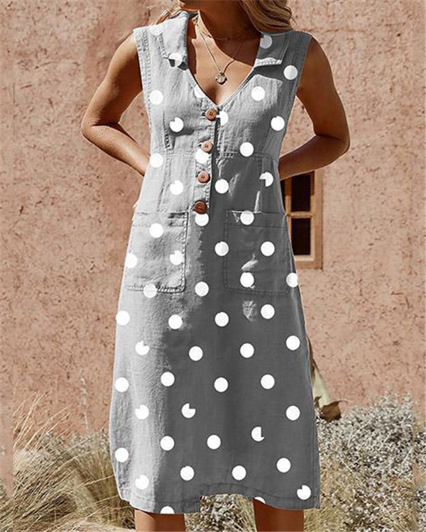 Elegante jurk met zakken en stippen, knoopsluiting, in grote maten