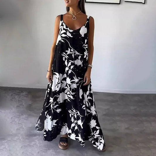 Lange mouwloze jurk met bloemenprint, ideaal voor zonnige dagen