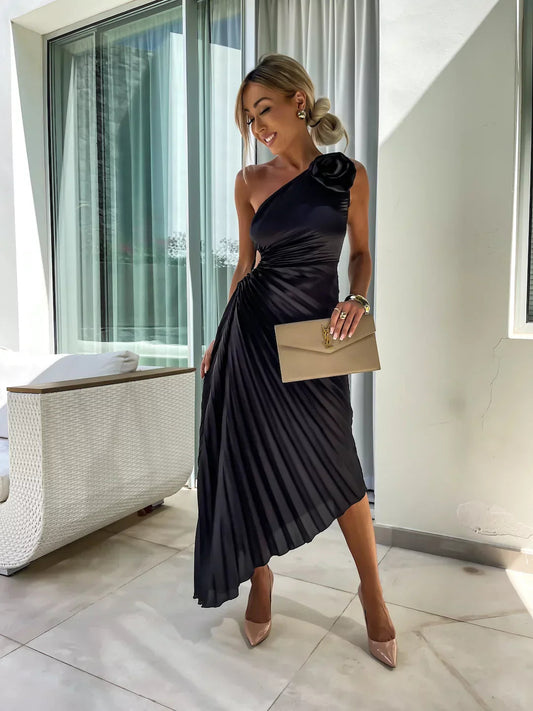 Elegante midi-jurk met asymmetrisch patroon en één schouderband