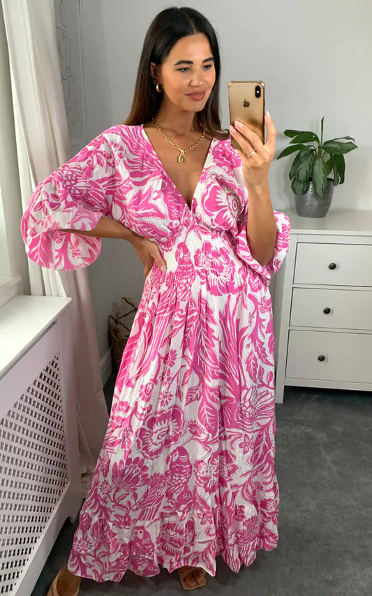 Lange jurk met V-hals en bloemenprint in blauw en wit
