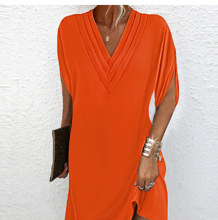 Elegante jurk met open mouwen en V-halslijn